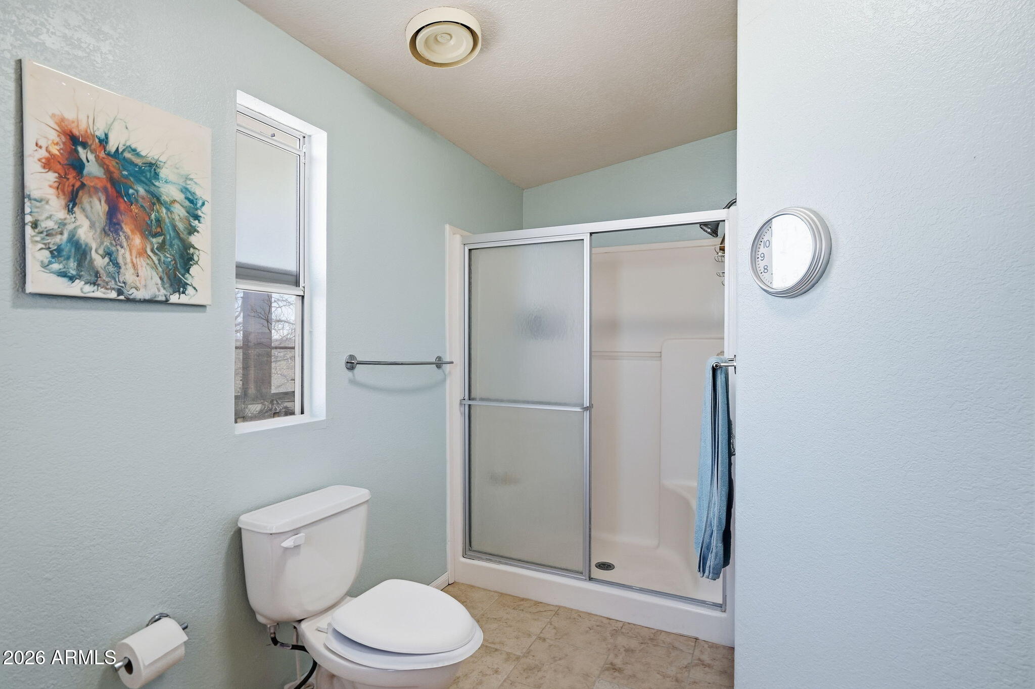816 North Ridgeview Place Huachuca City, AZ 85616 - Photo 27 of 46 a white toilet sitting next to a bathroom sink