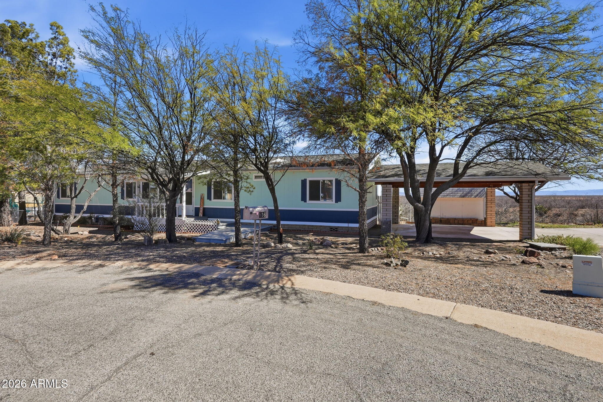 816 North Ridgeview Place Huachuca City, AZ 85616 - Photo 2 of 46 a house view with a outdoor space