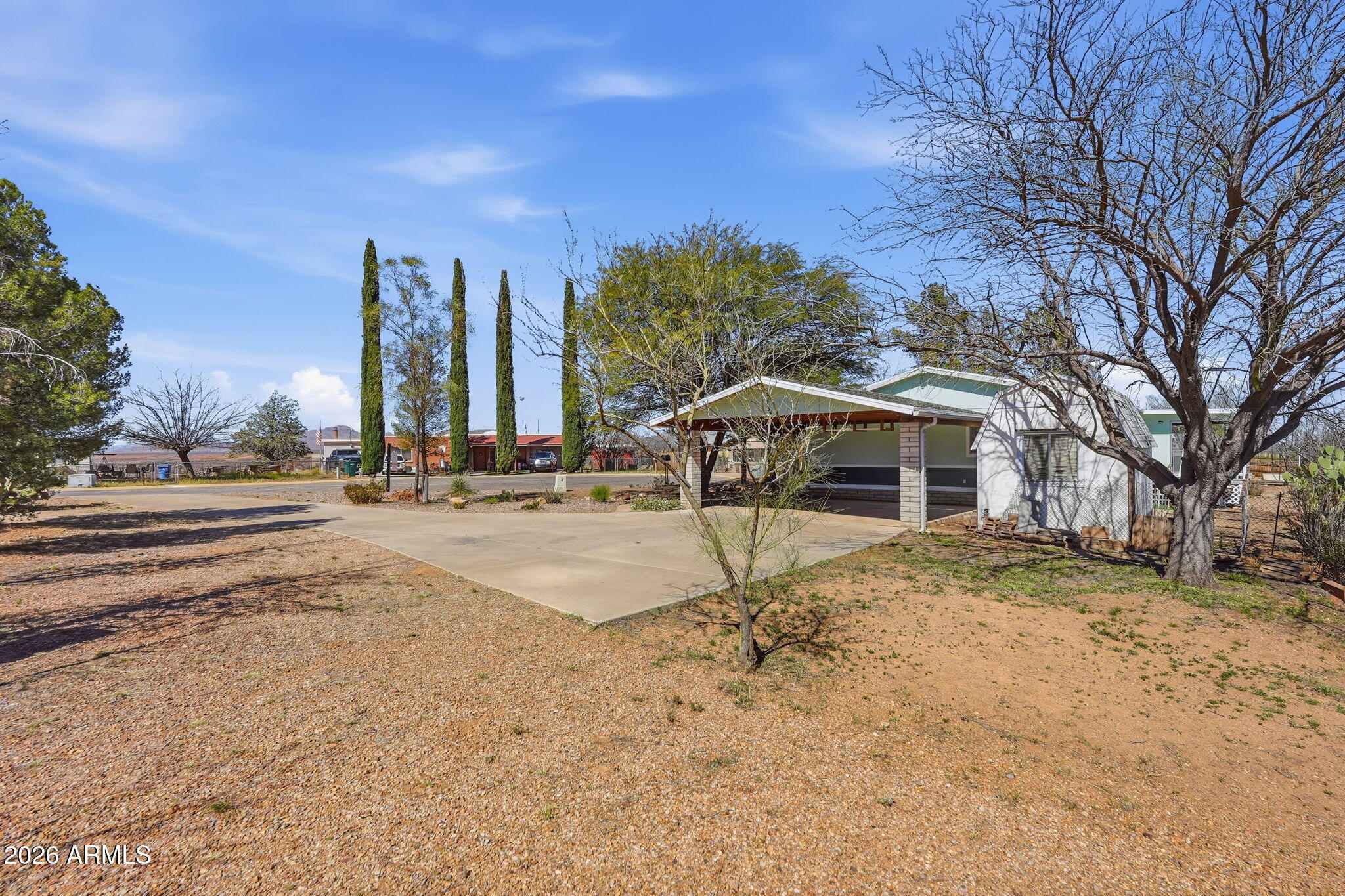 816 North Ridgeview Place Huachuca City, AZ 85616 - Photo 6 of 46 a view of a yard with a house