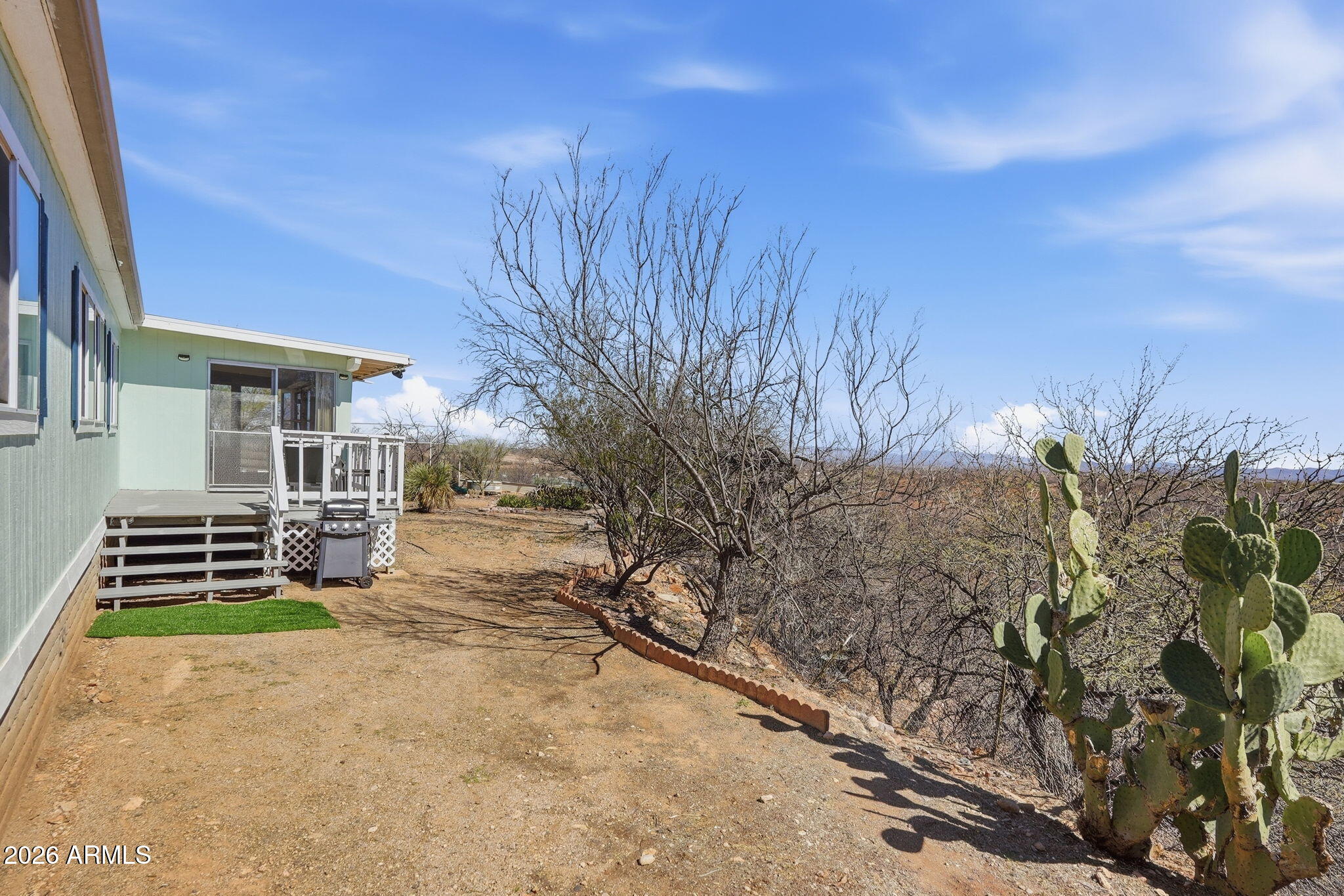 816 North Ridgeview Place Huachuca City, AZ 85616 - Photo 7 of 46 a view of a house with a yard