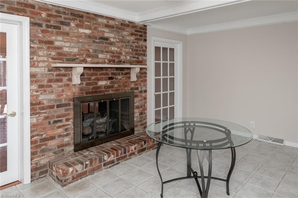7204 Haw Ridge Road Summerfield, NC 27358 - Photo 5 of 43 Breakfast area accessible from living room though doors or opens from kitchen