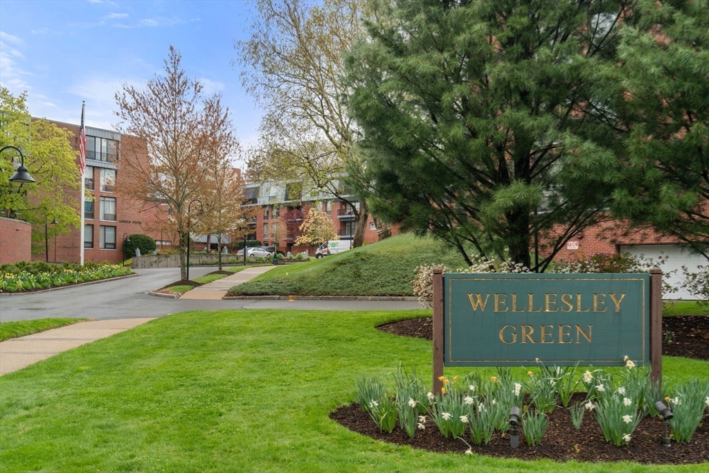 75 Grove Street, Unit 227 Wellesley, MA 02482 - Photo 29 of 29 a sign on the side of the road