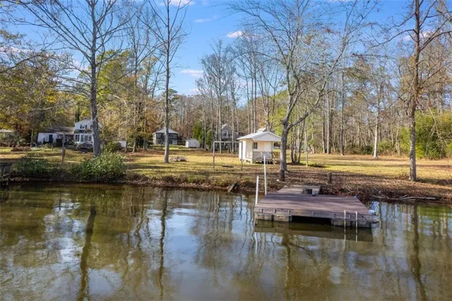 a view of river covered with trees