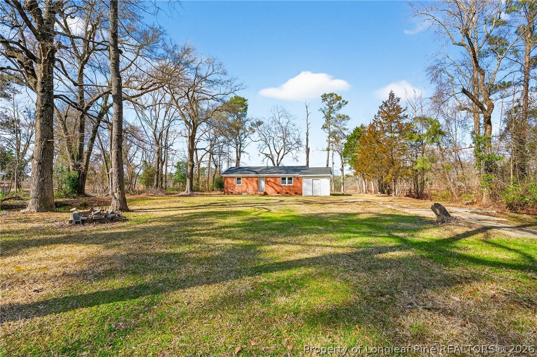 1586 Tom Starling Road Fayetteville, NC 28306 - Photo 35 of 44 a view of a water fountain in front of a house