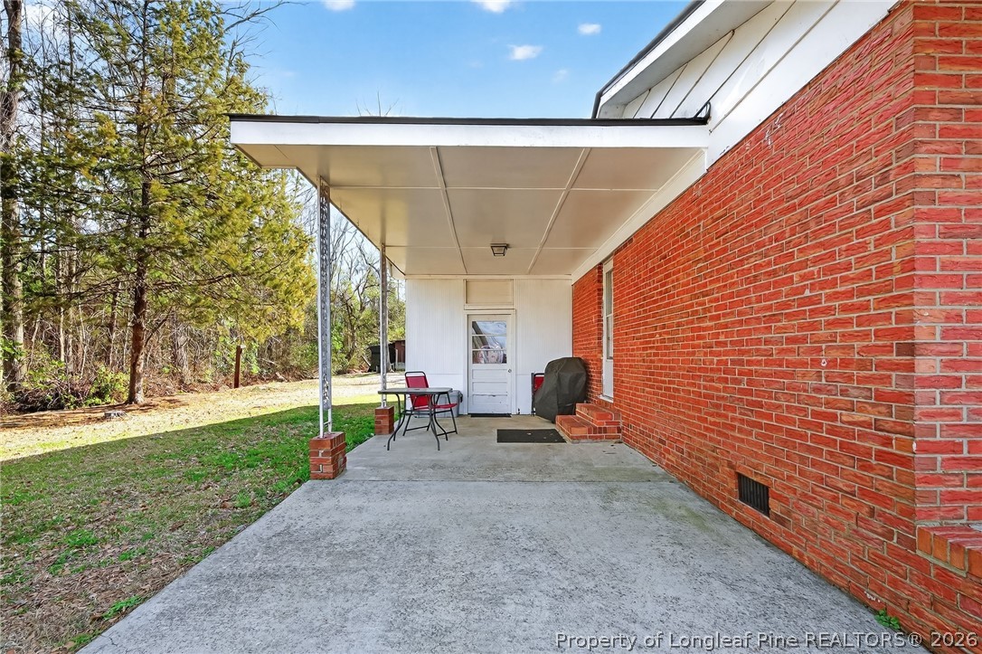 1586 Tom Starling Road Fayetteville, NC 28306 - Photo 4 of 44 a view of outdoor space with seating area