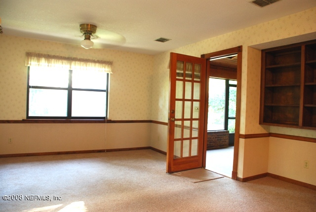 3140 Rococo Court Orange Park, FL 32073 - Photo 8 of 24 Kitchen opens to Den with Built-ins