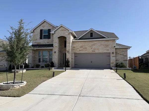 a front view of house with yard