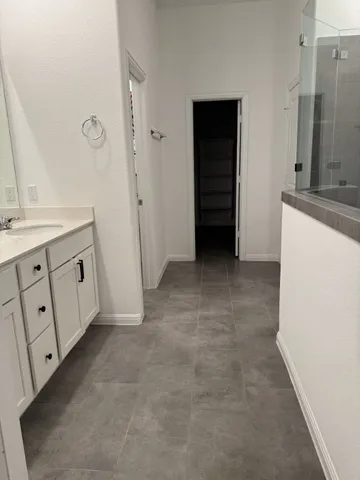 a view of an empty walk in closet