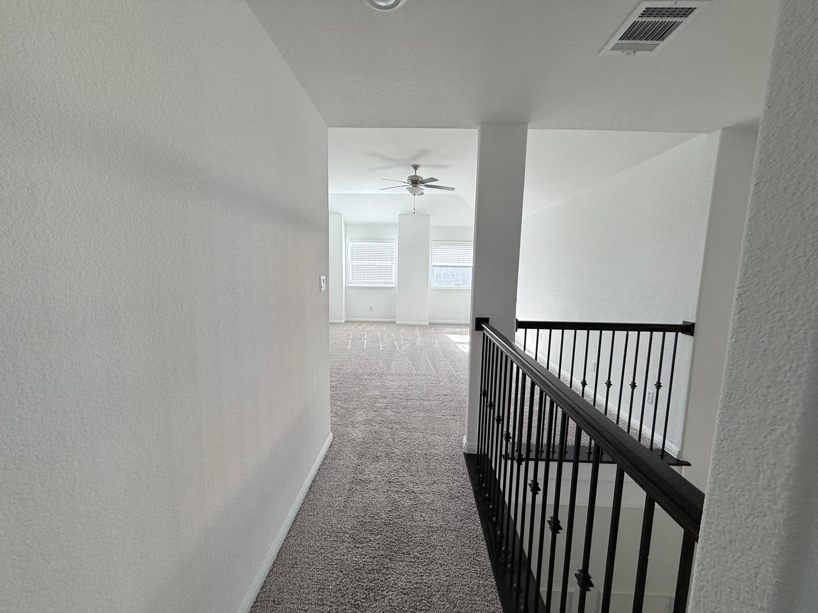 160 Venti Cove Georgetown, TX 78628 - Photo 13 of 40 a view of a hallway with a window