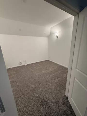 an empty room with an entryway