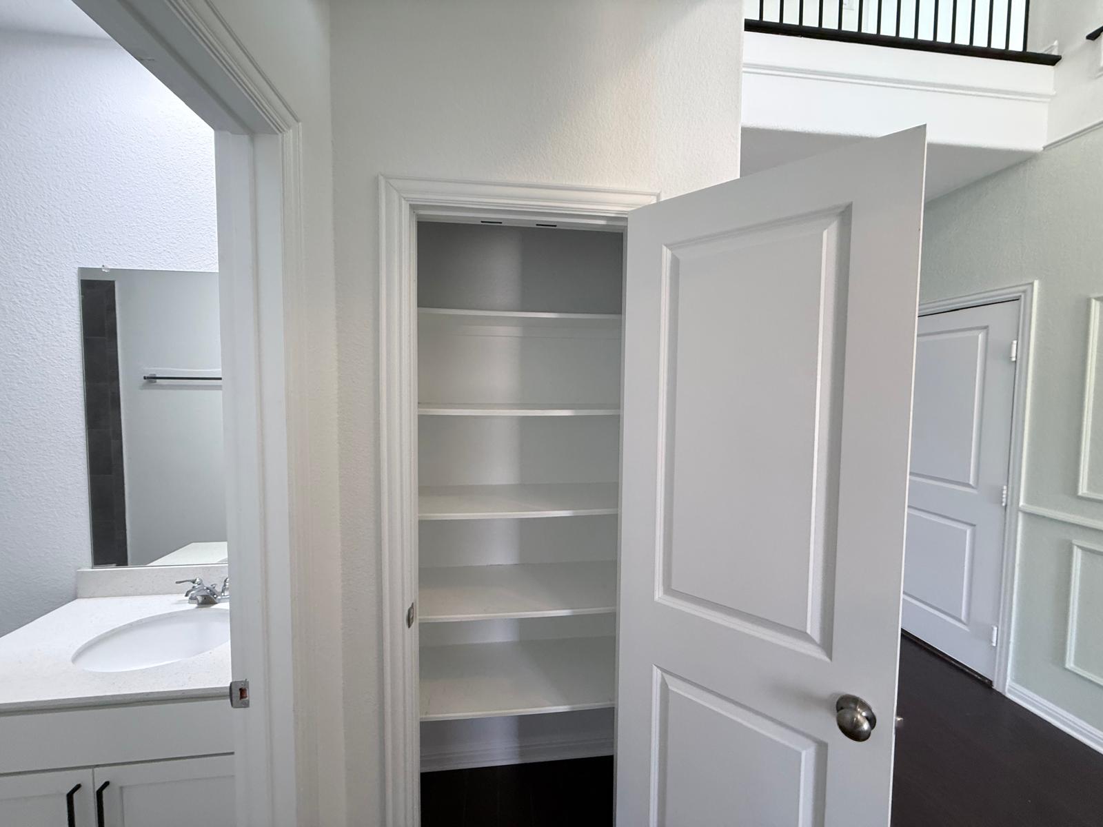 160 Venti Cove Georgetown, TX 78628 - Photo 20 of 40 a view of walk in closet with empty racks