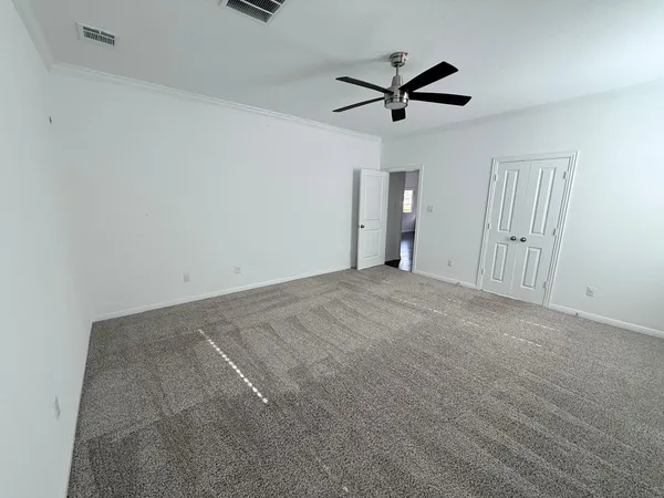 a view of an empty walk in closet