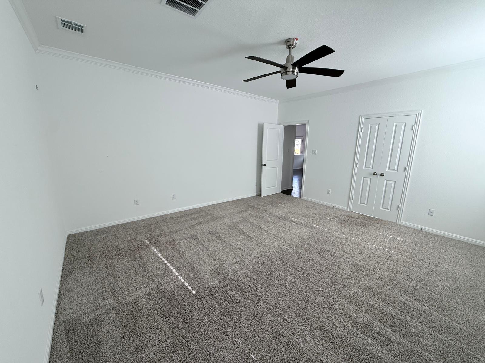 160 Venti Cove Georgetown, TX 78628 - Photo 27 of 40 a view of a livingroom with a ceiling fan and window