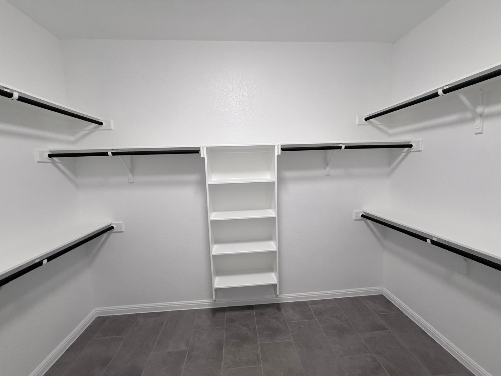 160 Venti Cove Georgetown, TX 78628 - Photo 28 of 40 a view of an empty walk in closet