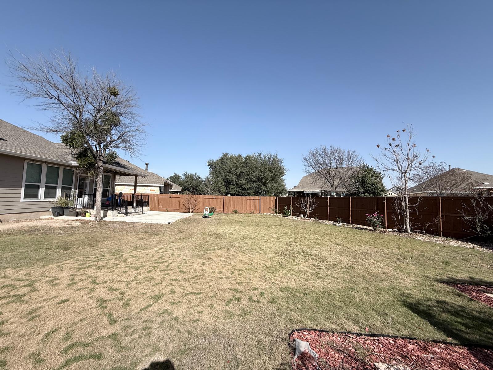 160 Venti Cove Georgetown, TX 78628 - Photo 38 of 40 a view of a house with a yard and snow