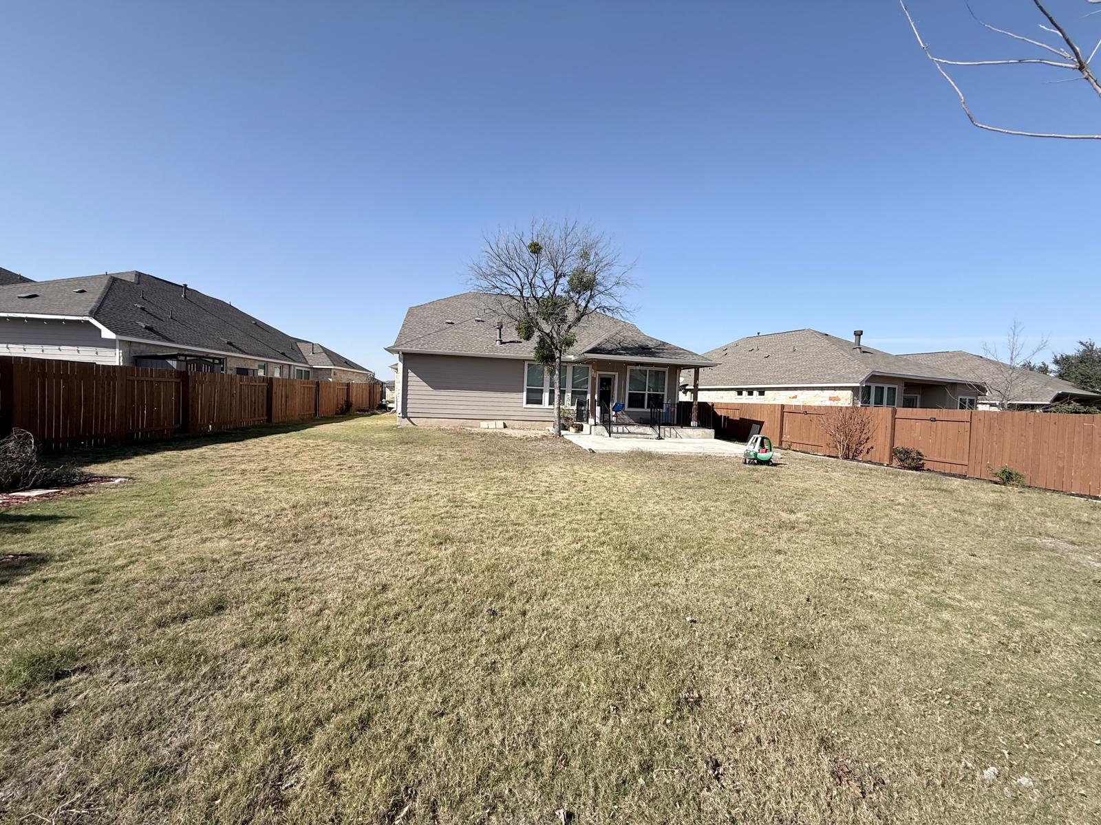 160 Venti Cove Georgetown, TX 78628 - Photo 40 of 40 a view of a house with a yard and sitting area