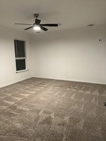 a white toilet sitting next to a toilet