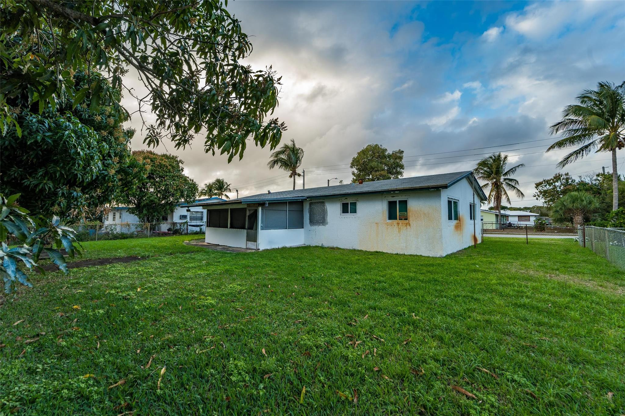 241 West 20th Street Riviera Beach, FL 33404 - Photo 4 of 43 Rear Exterior View of the Property.