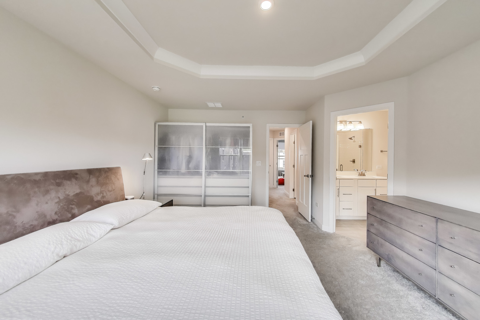 205 Dawson Drive Mount Prospect, IL 60056 - Photo 16 of 28 a bedroom with a large bed and dresser