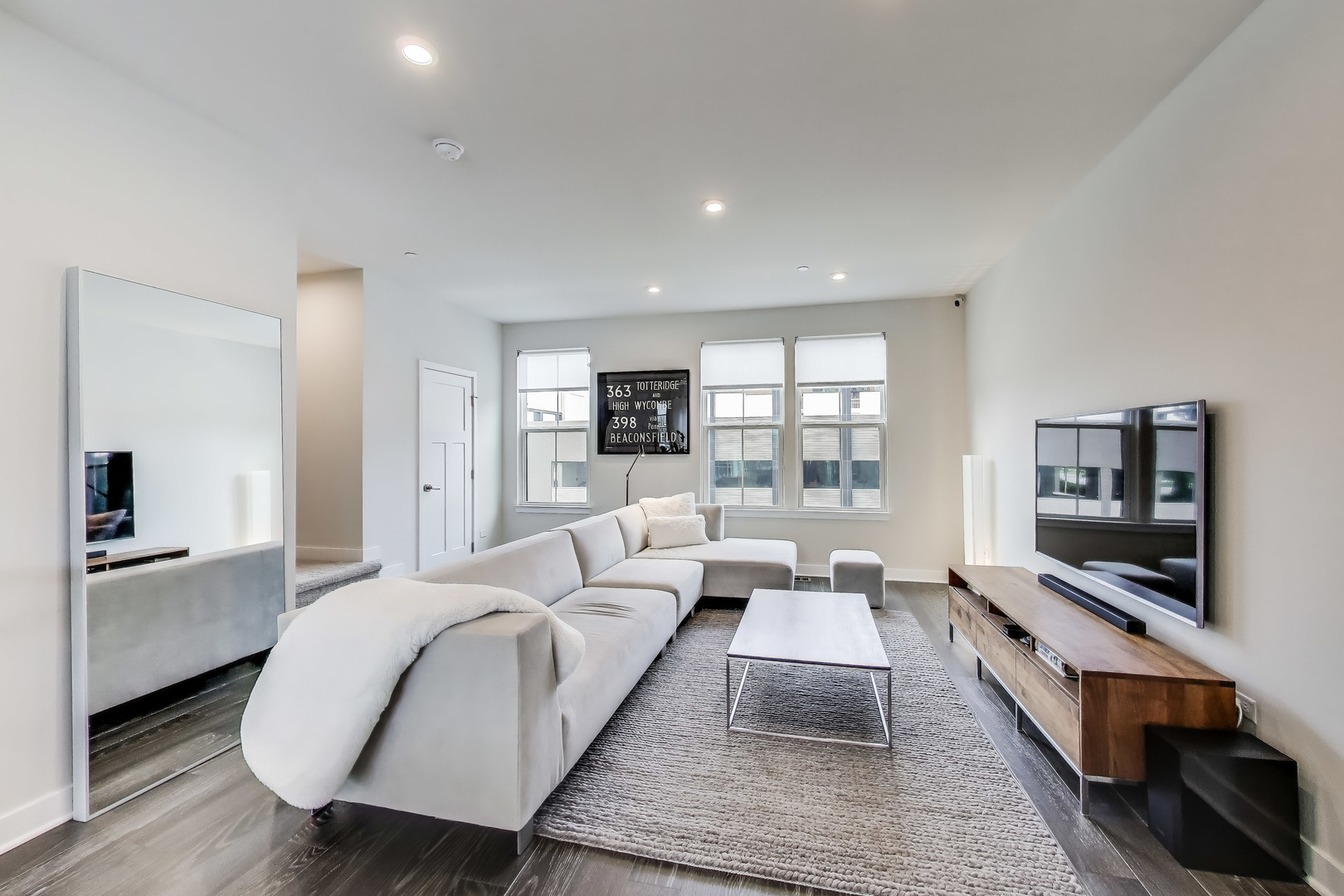 205 Dawson Drive Mount Prospect, IL 60056 - Photo 5 of 28 a living room with furniture and a flat screen tv
