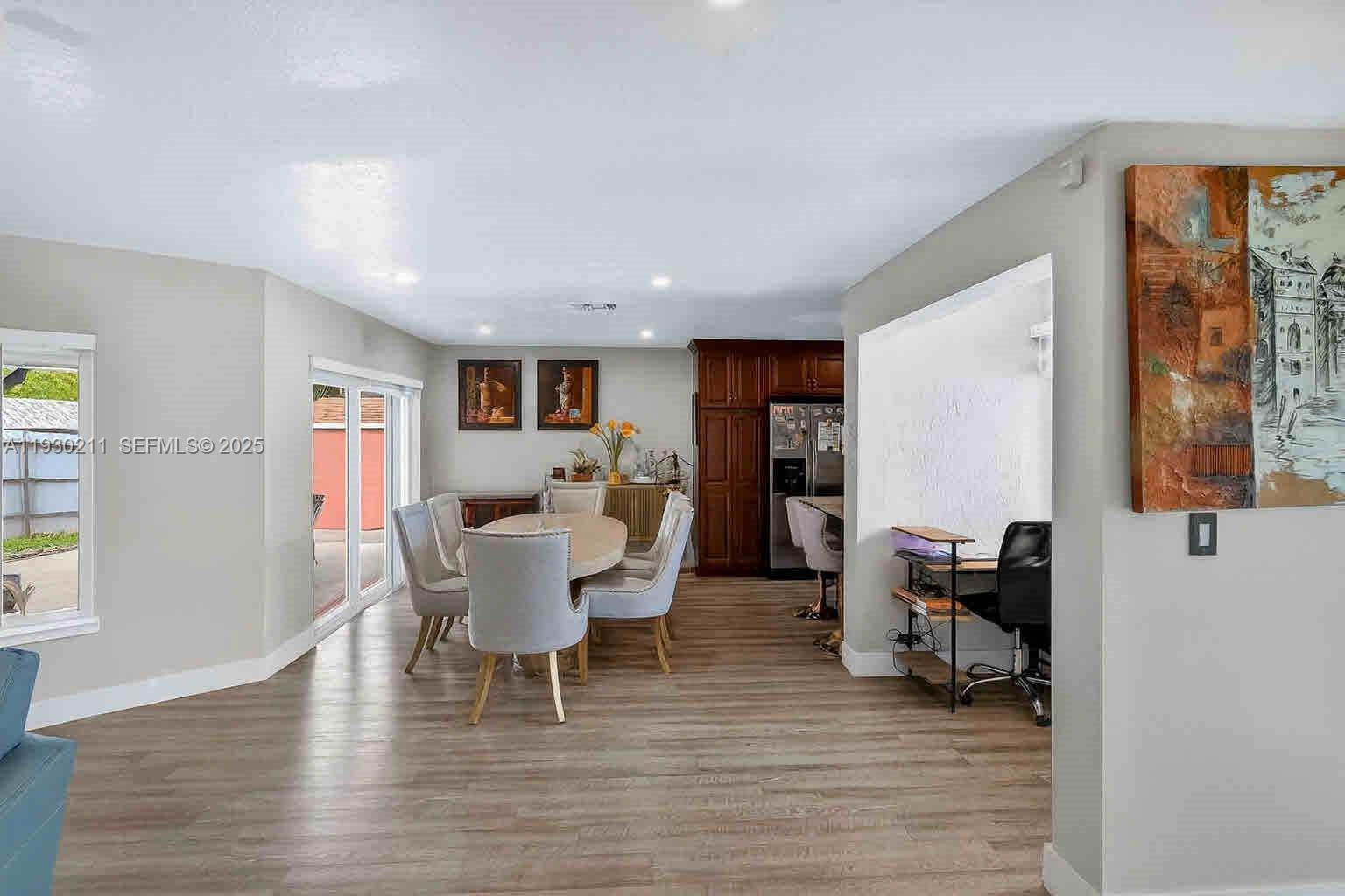 20810 Southwest 125th Court Road Miami, FL 33177 - Photo 13 of 52 a living room with furniture and a wooden floor