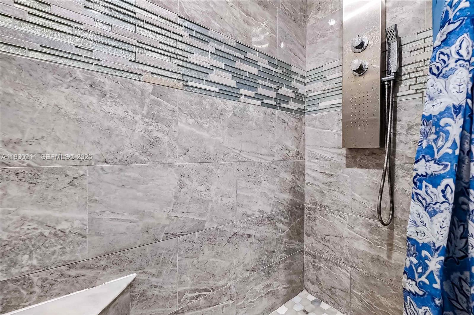 20810 Southwest 125th Court Road Miami, FL 33177 - Photo 29 of 52 a bathroom with a shower