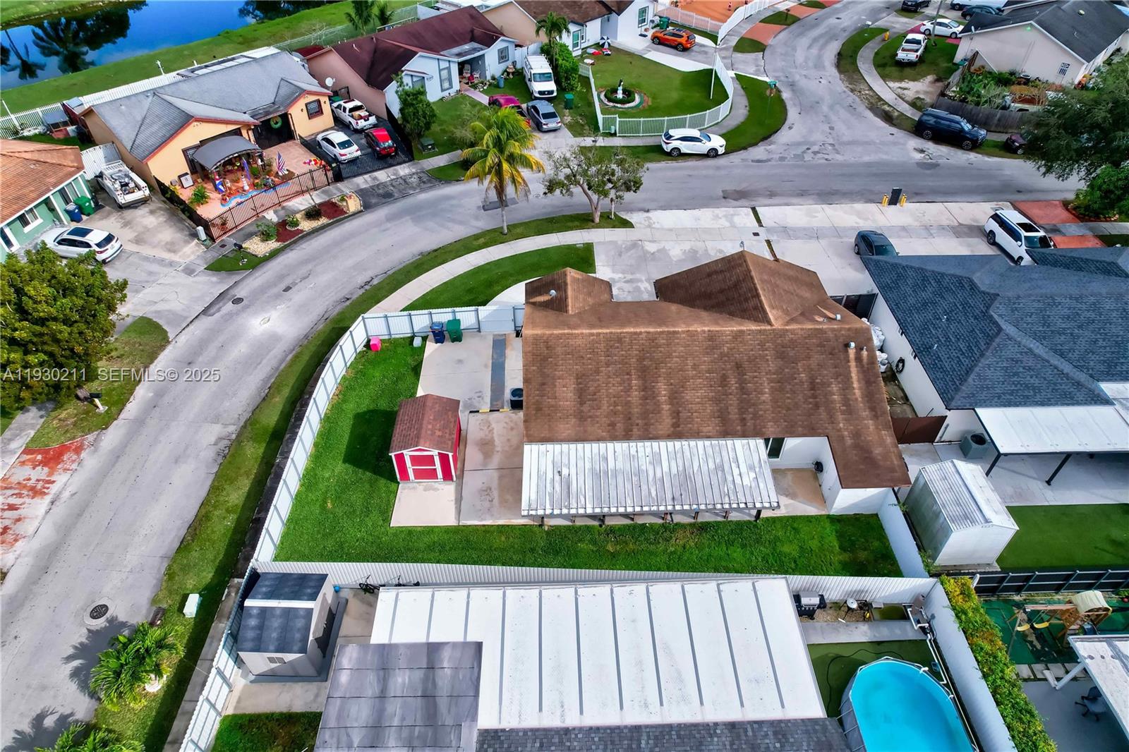 20810 Southwest 125th Court Road Miami, FL 33177 - Photo 4 of 52 an aerial view of a house with a garden and outdoor space