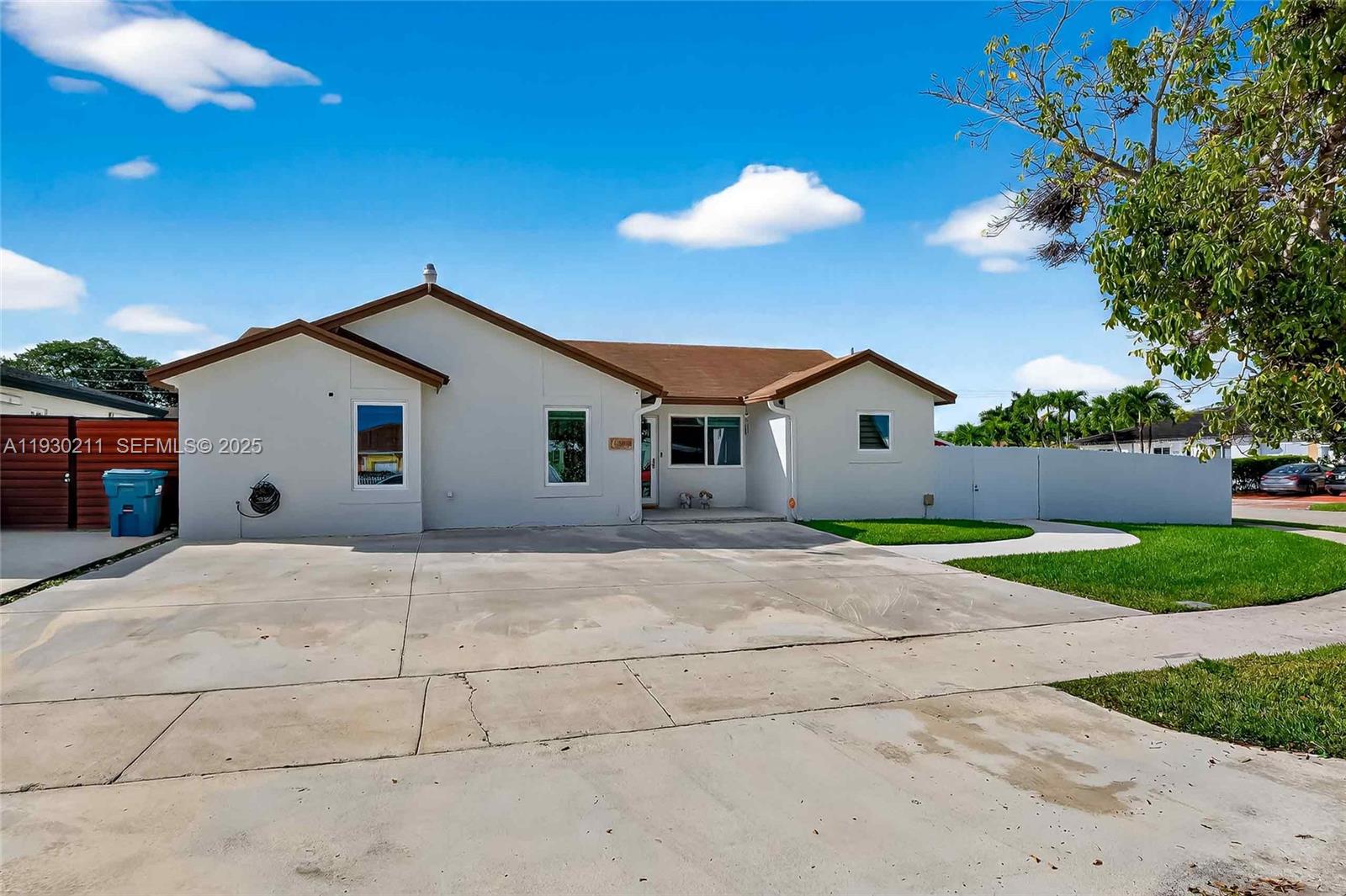 20810 Southwest 125th Court Road Miami, FL 33177 - Photo 43 of 52 a view of backyard of house garage and yard