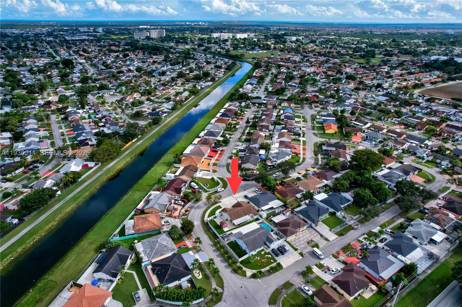 20810 Southwest 125th Court Road Miami, FL 33177 - Photo 48 of 52 an aerial view of residential houses with outdoor space and trees
