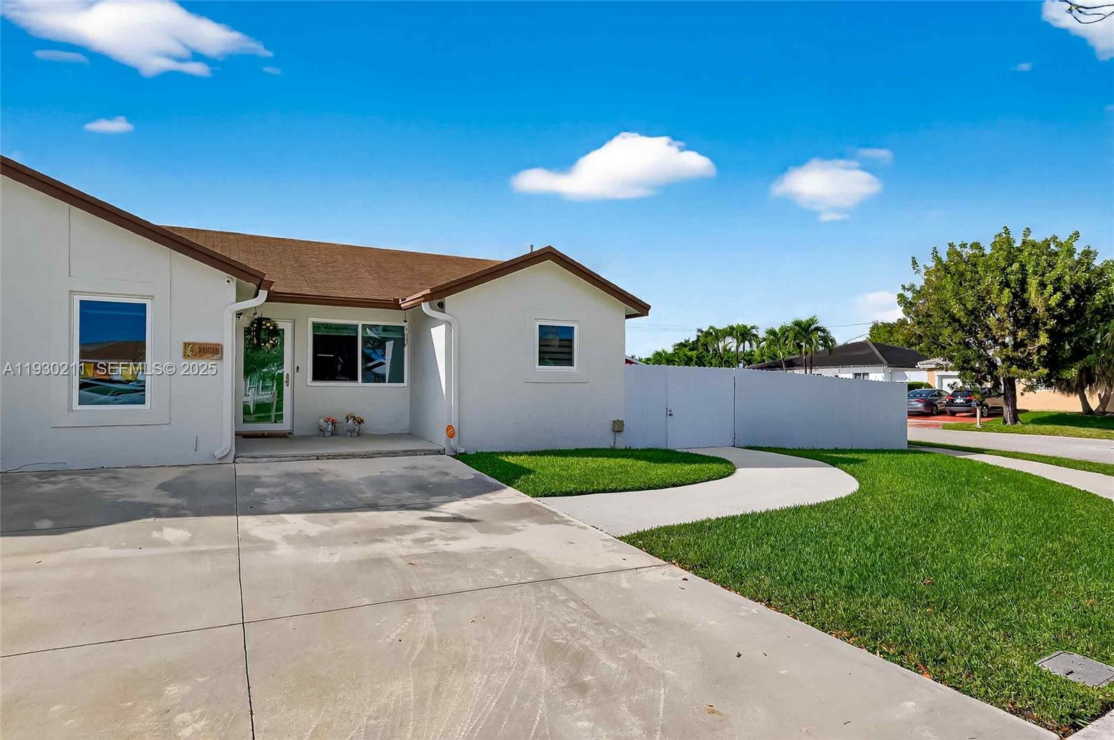 20810 Southwest 125th Court Road Miami, FL 33177 - Photo 6 of 52 a view of backyard of house with entertaining space