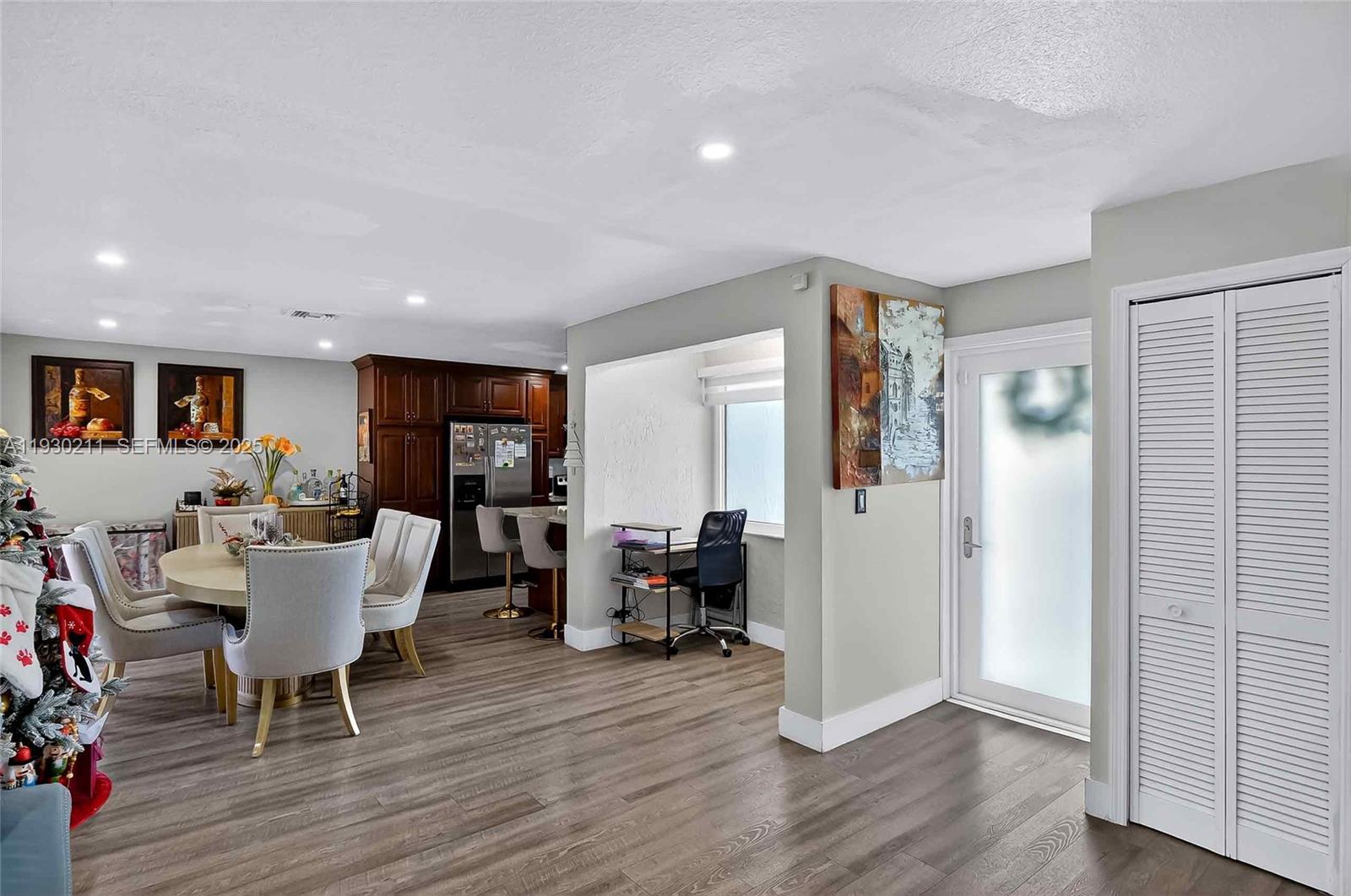 20810 Southwest 125th Court Road Miami, FL 33177 - Photo 8 of 52 a living room with furniture and wooden floor