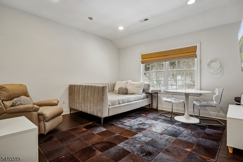 91 Mosle Road Peapack-Gladstone, NJ 07931 - Photo 23 of 37 a living room with furniture and a window