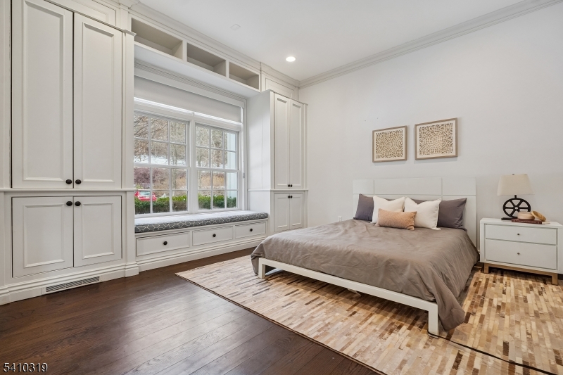 91 Mosle Road Peapack-Gladstone, NJ 07931 - Photo 28 of 49 a bedroom with a bed and a window