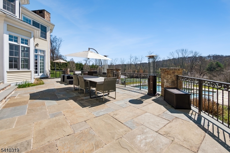 91 Mosle Road Peapack-Gladstone, NJ 07931 - Photo 38 of 49 a view of a terrace with chairs