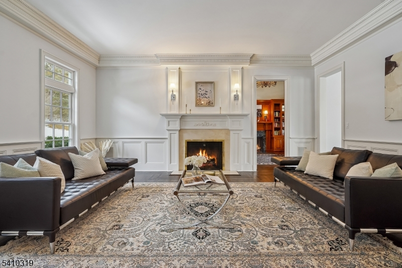 91 Mosle Road Peapack-Gladstone, NJ 07931 - Photo 7 of 37 a living room with furniture and a fireplace