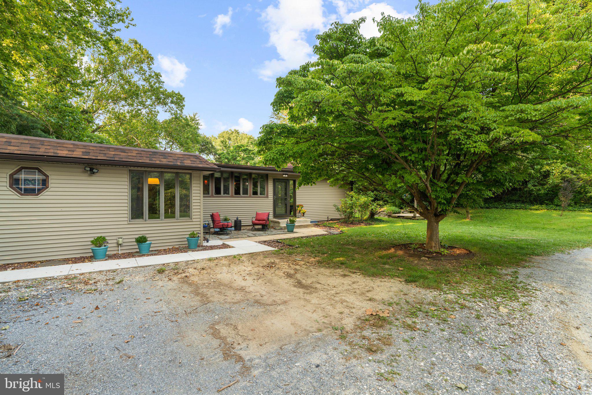 716 Andover Road Linthicum Heights, MD 21090 - Photo 2 of 48 a view of a house with backyard and a tree