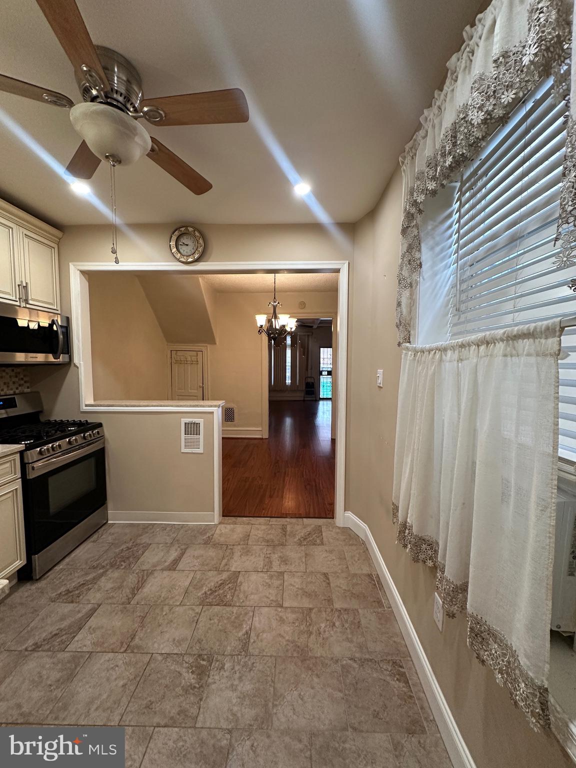 5403 Webster Street Philadelphia, PA 19143 - Photo 9 of 25 a view of a hallway with a kitchen