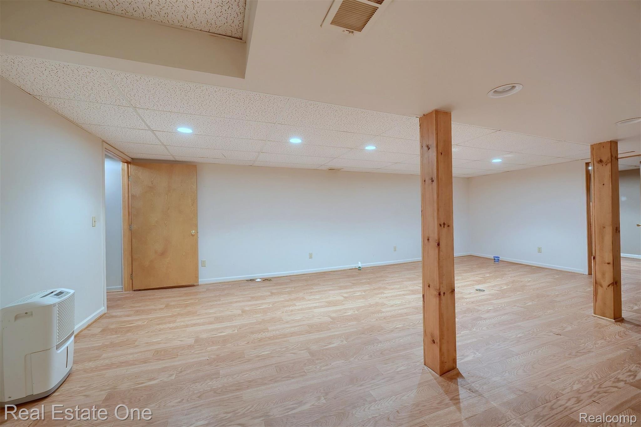424 Hill Street Rochester, MI 48307 - Photo 23 of 31 Finished-Lower-Level vinyl floor