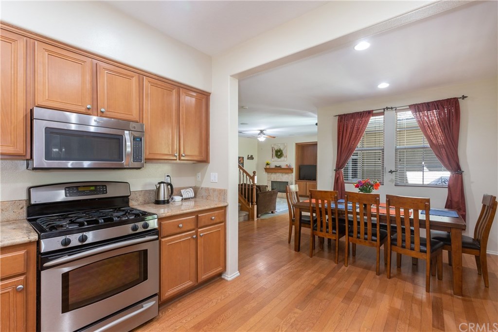 24002 Cornelia Place Valencia, CA 91354 - Photo 9 of 28 View from Kitchen past dining room to family room.