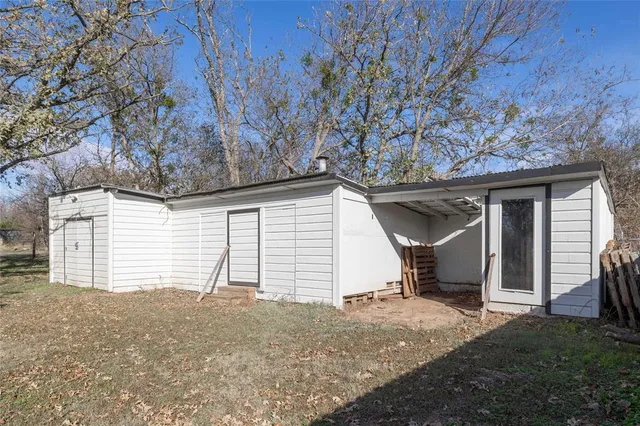 a view of a yard with tree s