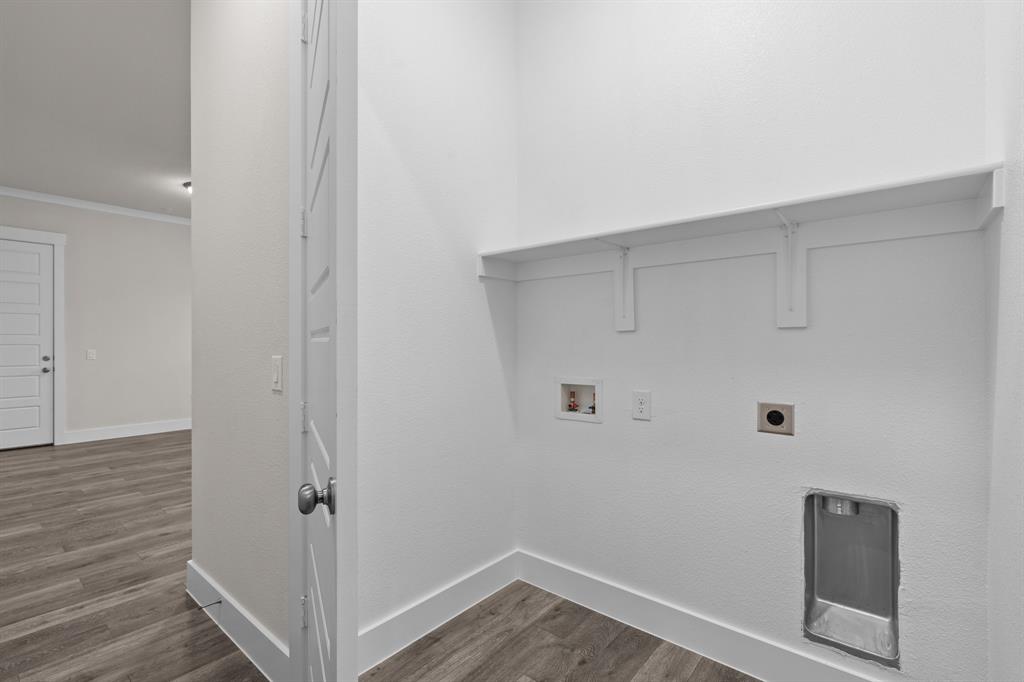 3280 Ganzer Road West, Unit 127B Denton, TX 76207 - Photo 10 of 22 a view of utility room