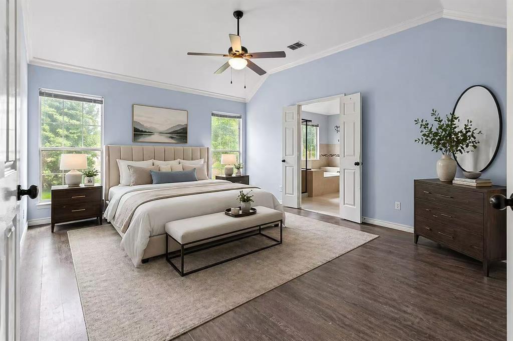 2604 Ridgewood Drive Plano, TX 75074 - Photo 17 of 35 Spacious bedroom with vaulted ceiling and wood-finish flooring