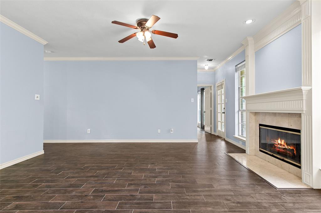 2604 Ridgewood Drive Plano, TX 75074 - Photo 5 of 35 Spacious living area featuring wood-finish flooring, a ceiling fan, and recessed lighting