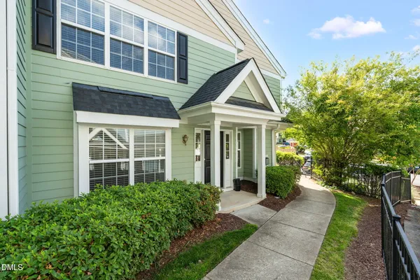 a house view with a garden space