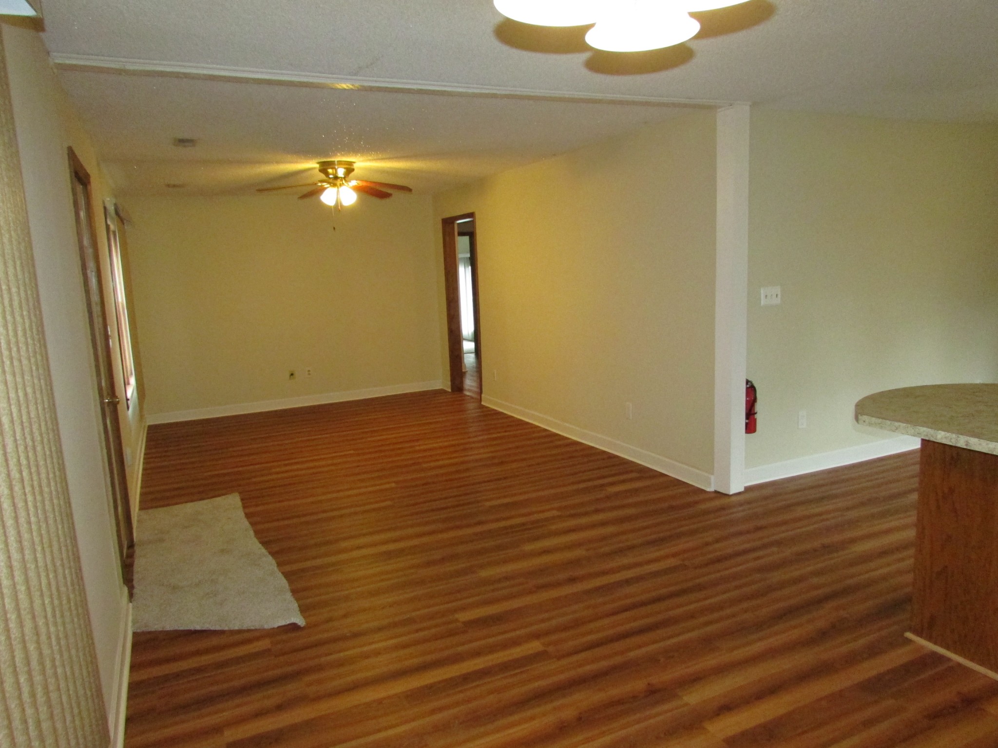 1251 Taylor Road Manchester, TN 37355 - Photo 9 of 34 a view of a room with wooden floor