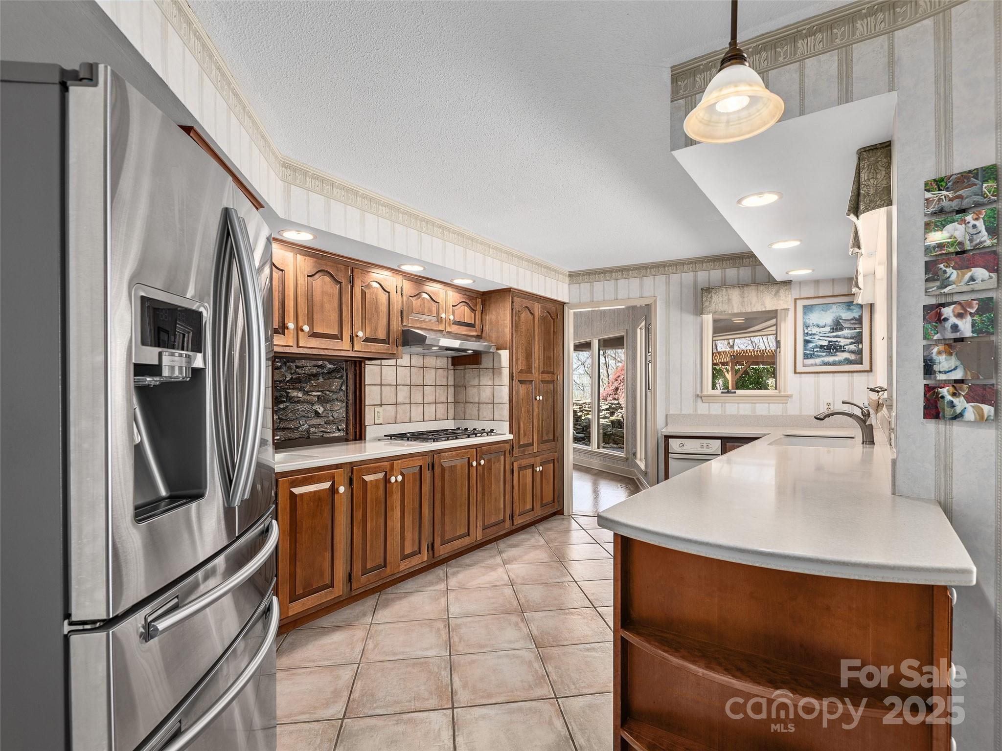 1300 Randy Drive Hendersonville, NC 28791 - Photo 14 of 48 a kitchen with stainless steel appliances granite countertop a refrigerator a oven a sink and dishwasher