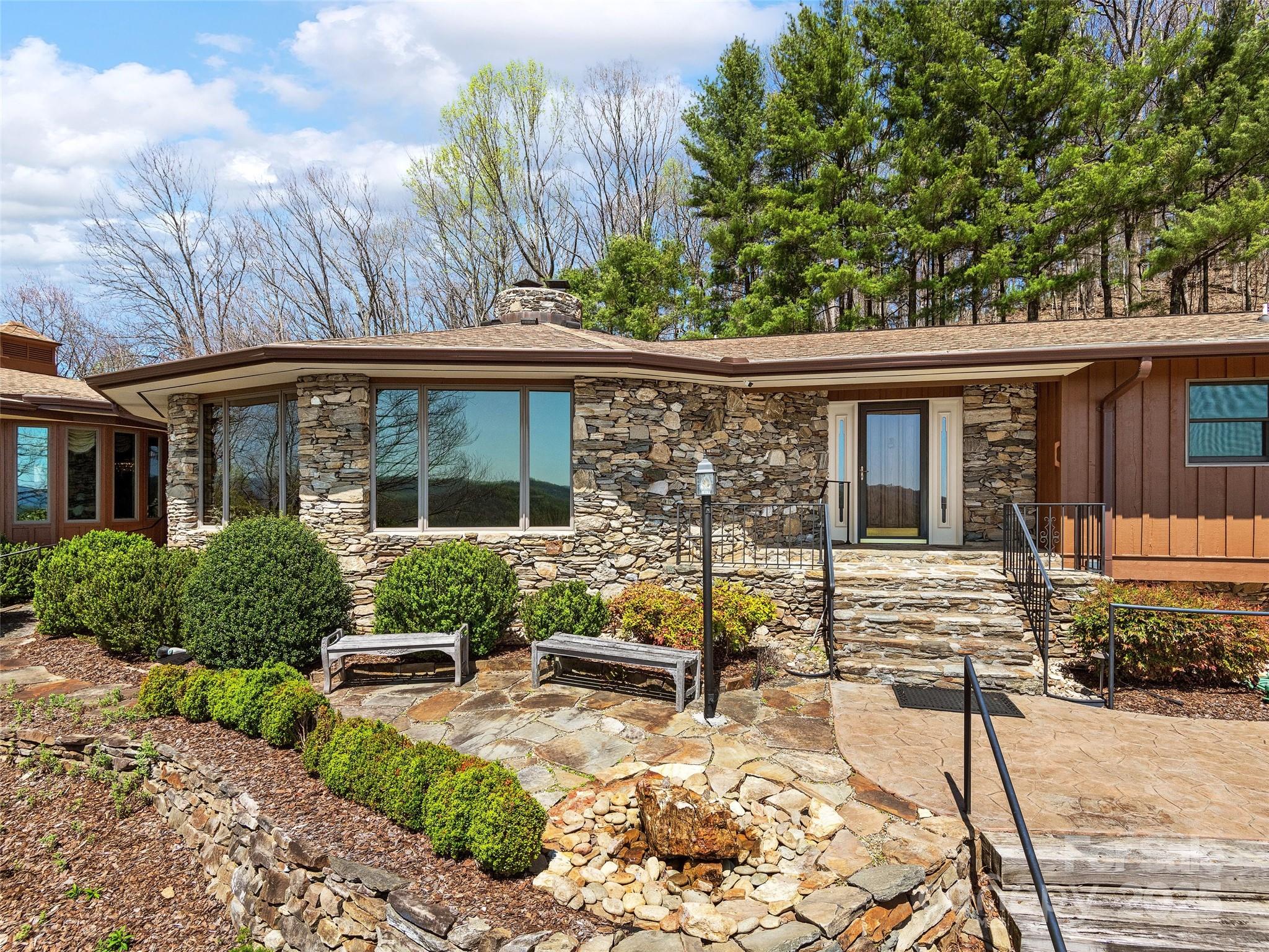 1300 Randy Drive Hendersonville, NC 28791 - Photo 2 of 48 a view of a house with backyard and sitting area