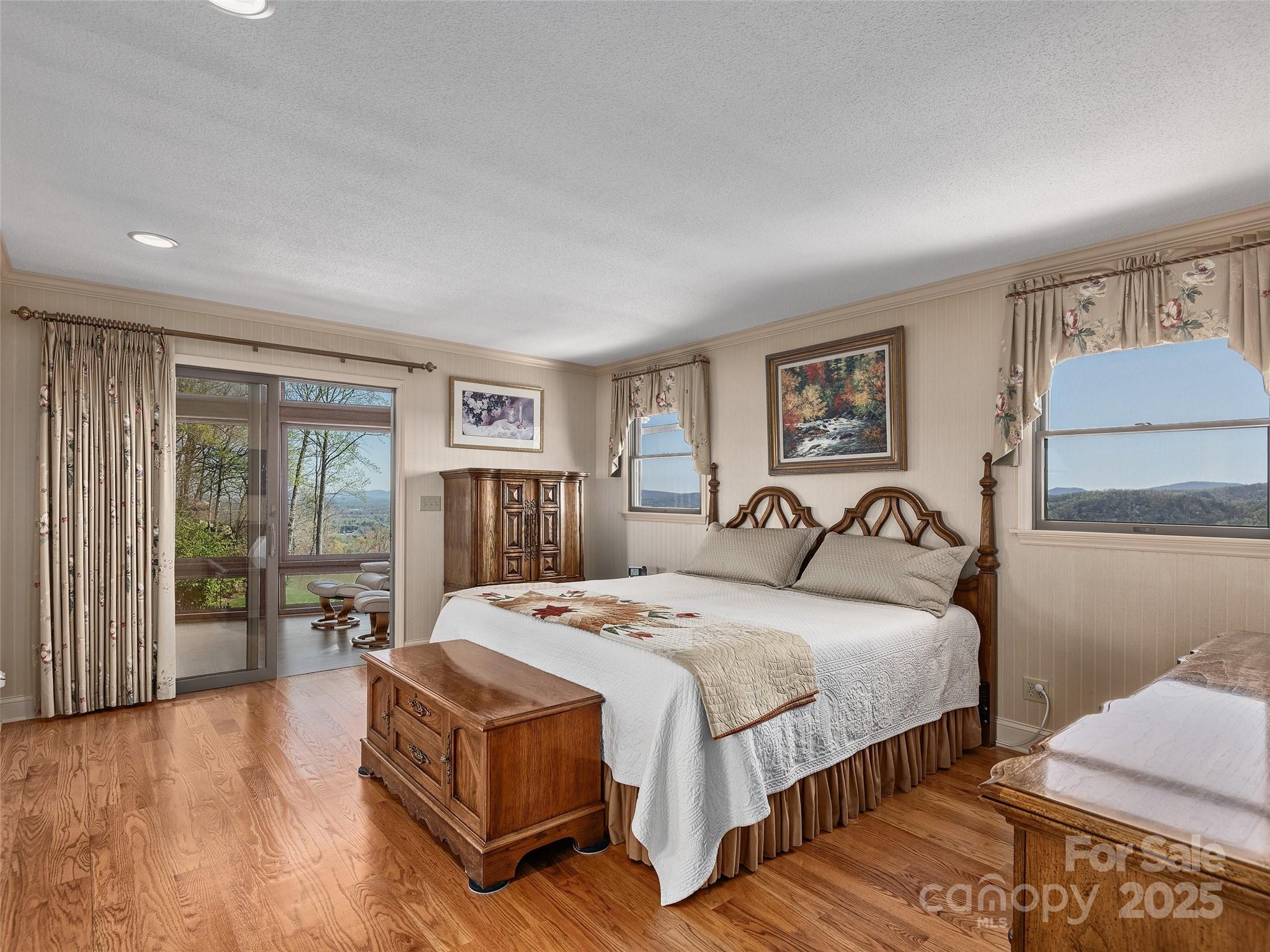 1300 Randy Drive Hendersonville, NC 28791 - Photo 25 of 48 a bedroom with a large bed and a window