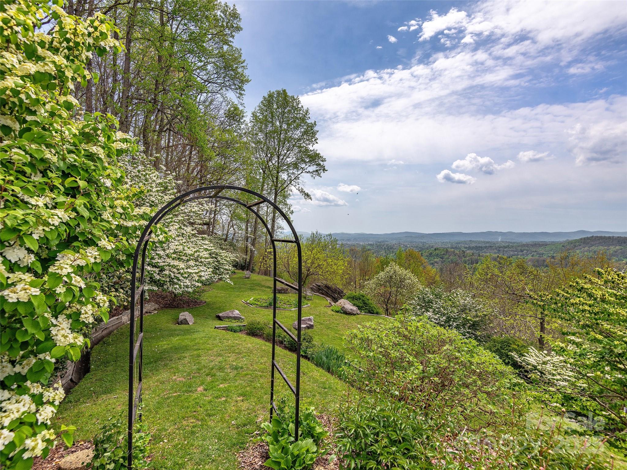 1300 Randy Drive Hendersonville, NC 28791 - Photo 31 of 48 a view of a garden