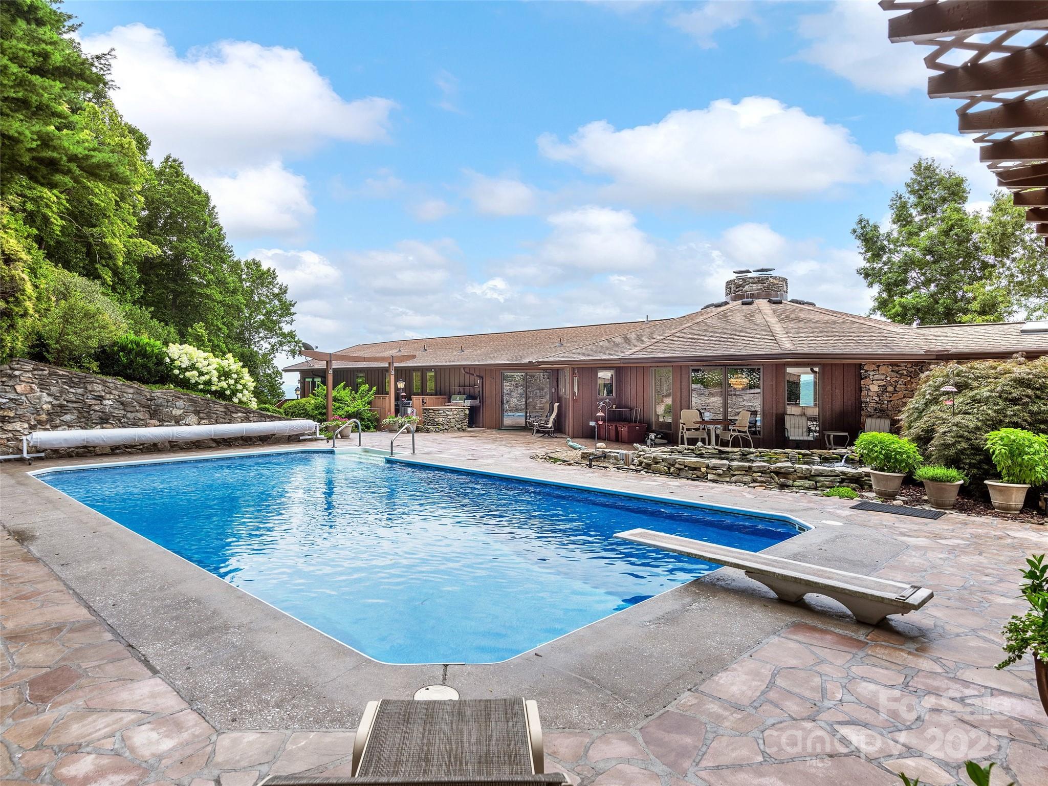 1300 Randy Drive Hendersonville, NC 28791 - Photo 38 of 48 a view of a house with swimming pool